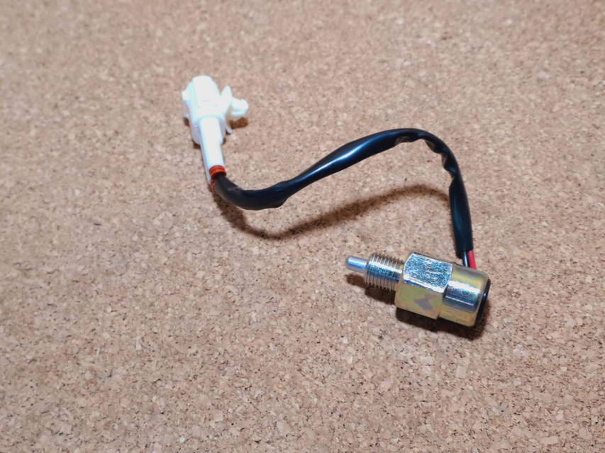 Датчик заднего хода на коробке передач (бензин) ZX Landmark