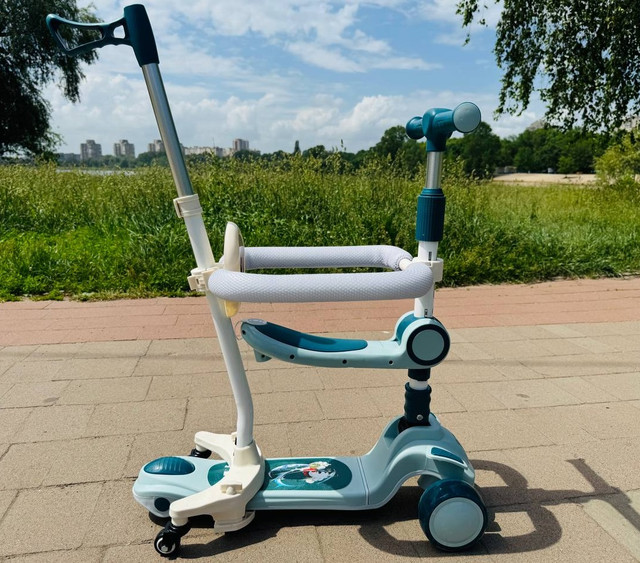 Самокат з батьківською ручкою та сидінням