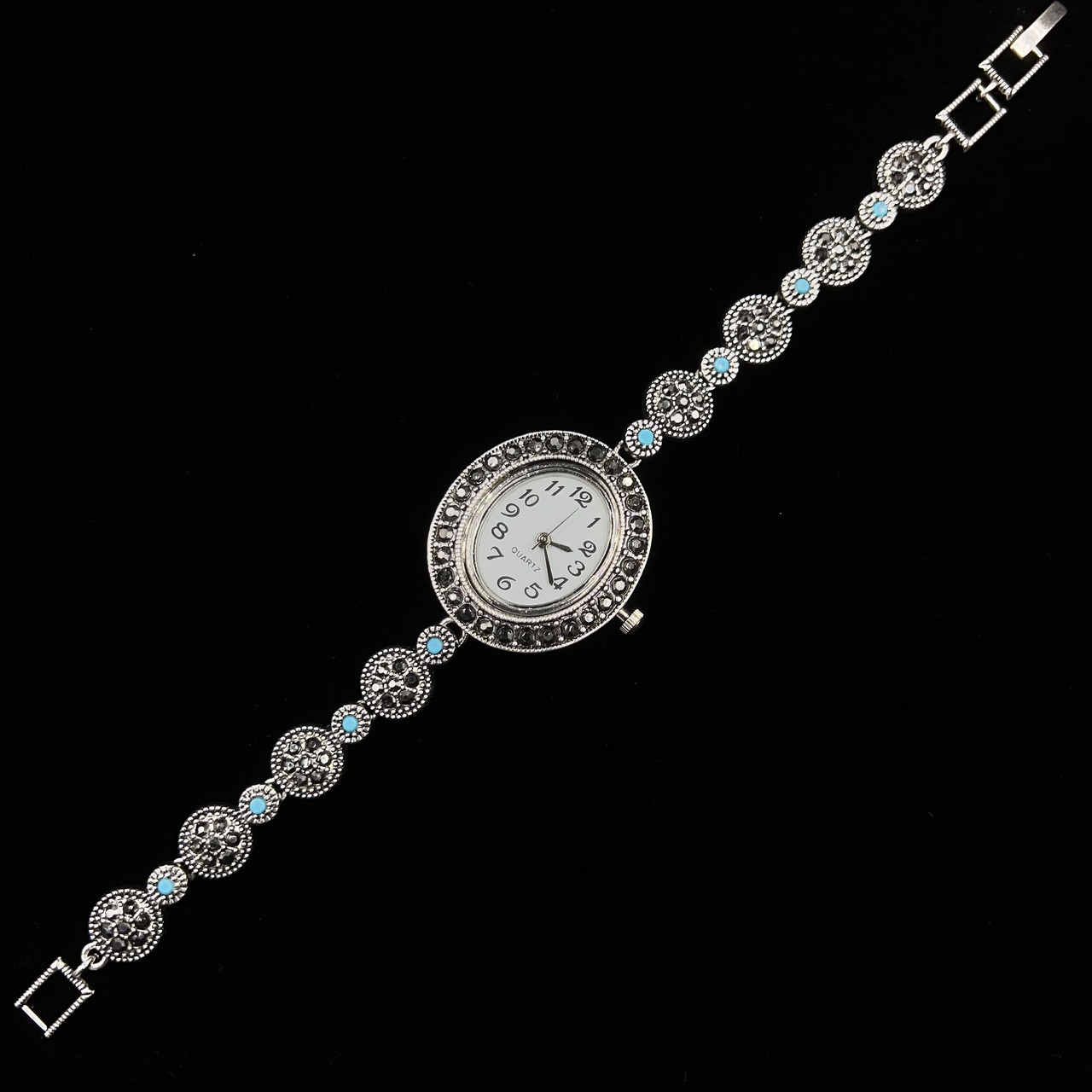 Женские часы винтажные кварцевые металл в серебристом цвете с серыми и бирюзовыми камнями длина 19 см - фото 1 - id-p2633642721
