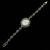 Женские часы винтажные овальные кварцевые в золотистом цвете с изумрудными стразами длина 19 см