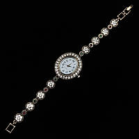 Женские часы винтажные овальные кварцевые в золотистом цвете с разноцветными камушками длина 19 см