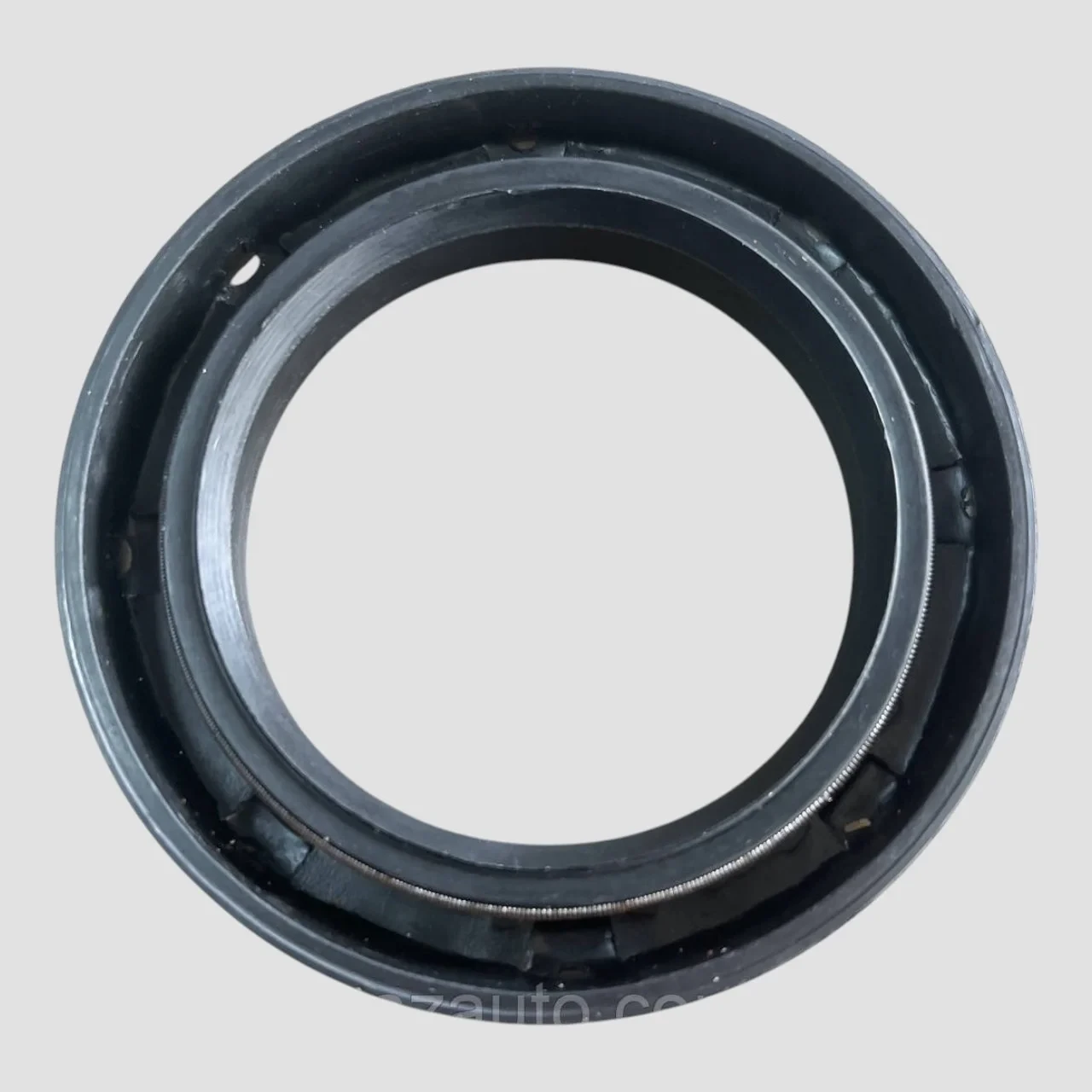 Сальник вала вторинного КПП ЗІЛ лівого обертання 58х84х16. 309860, фото 1