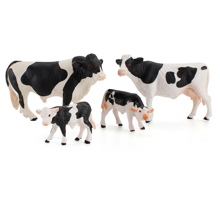Розвиваючий набір фігурок Сім'я чорно-білих корів (4 шт) від Obetty, фото 1