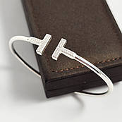 Браслет срібний незамкнутий з білими круглими фіанітами