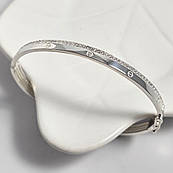 Браслет срібний жорсткий з орнаментом і фіанітами