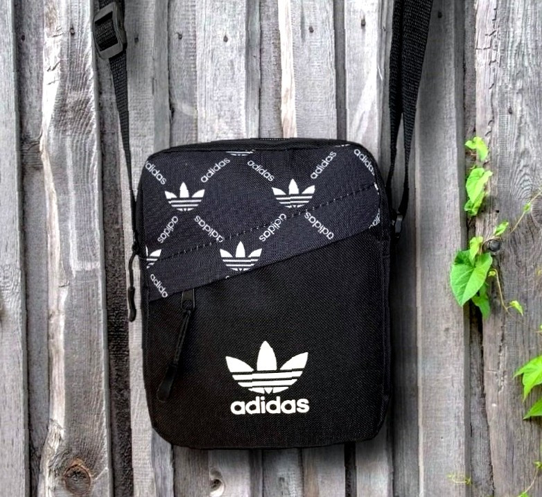 Барсетка в чорному кольорі - надійний аксесуар для міста Adidas
