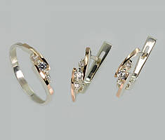 Срібний набір з золотими пластинами