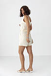 Літній жіночий костюм з топом на зав'язках і шортами кремовий красивий костюм на літо розмір Л, фото 3