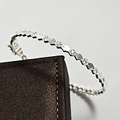 Браслет срібний жорсткий з білими круглими фіанітами