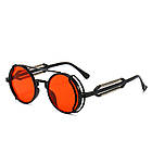 Червоні сонцезахисні круглі окуляри пастикові