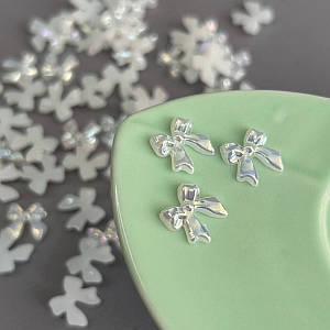 Напівнамистини «Бантики» 11 мм, 10 гр/уп - білий з покриттям АВ