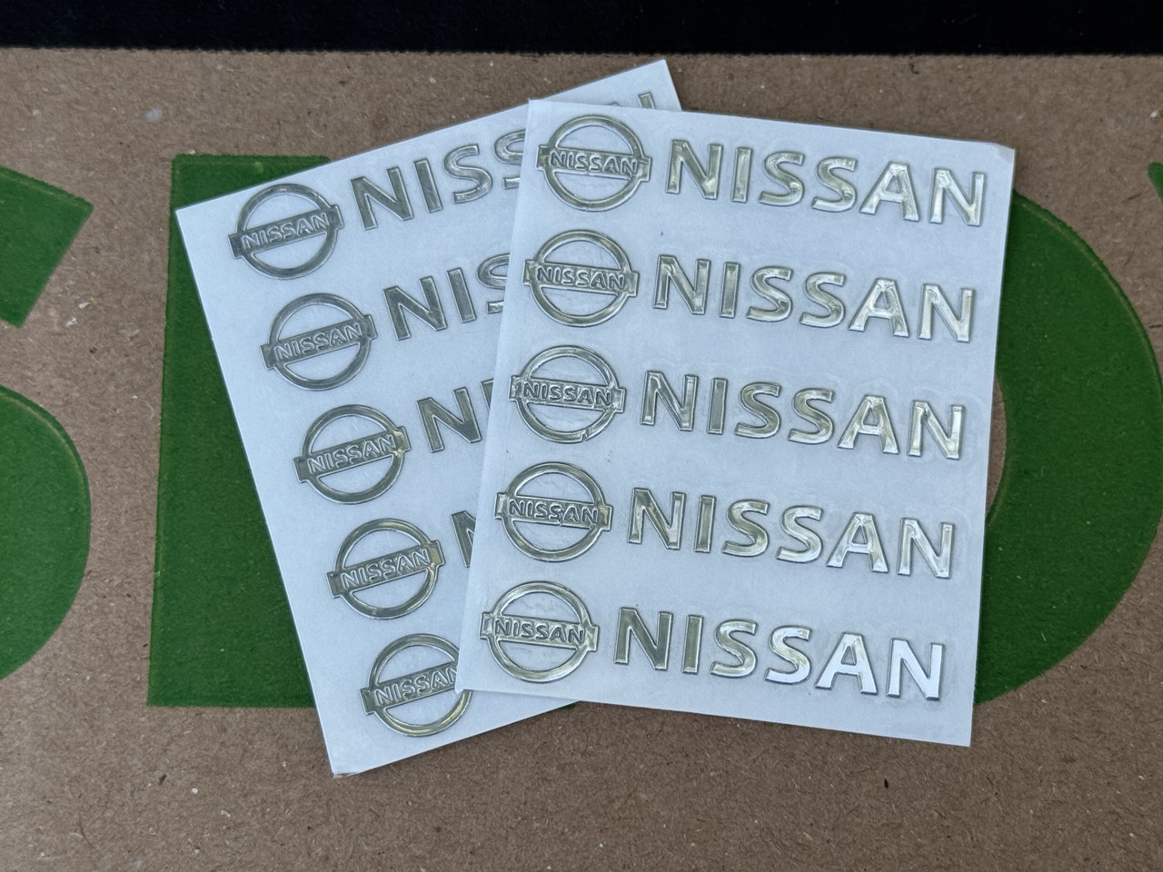 Набір металевих 3D наклейок Nissan (логотип + надпис, хром, 10 шт), фото 1