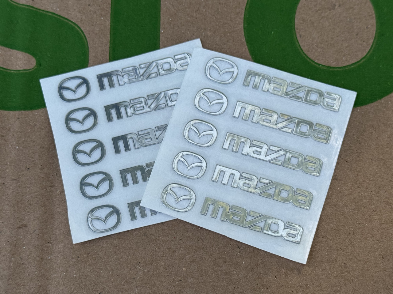 Набір металевих 3D наклейок Mazda (логотип + надпис, хром, 10 шт), фото 1