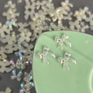 Напівнамистини «Бантики» 11 мм, 10 гр/уп - айворі з покриттям АВ