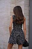 Чорний літній жіночий комбінезон-шорти з абстрактним принтом, фото 6