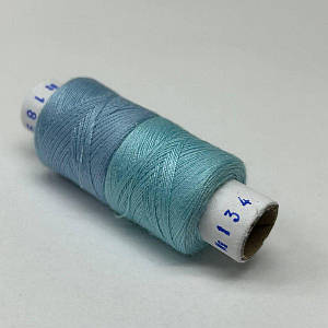 134/189 Нитки в котушках 40/2 , половинки (котушка 2х75м)