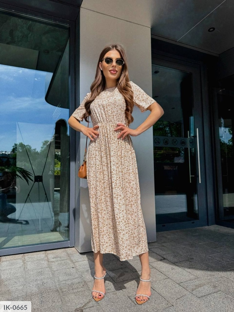 Класичне жіноче плаття натуральне тонке легке на літо за коліно міді розкльошене від талії на гумці