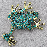 Брошка металева на золотистій основі жаба із зеленими кристалами розмір виробу 50х40 мм