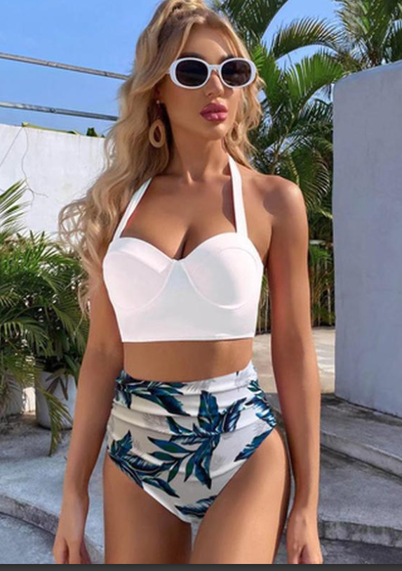 Жіночий купальник в стилі ретро білого кольору з високими трусиками.