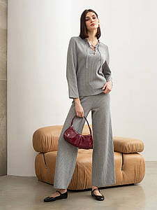 Теплий костюм жіночий брючний трикотажний осінній