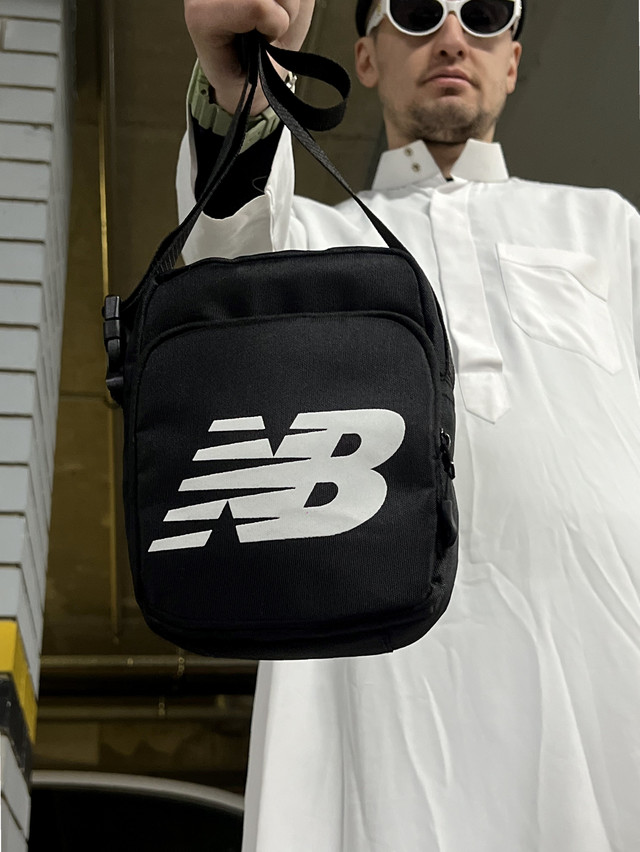 чорна барсетка для чоловіка