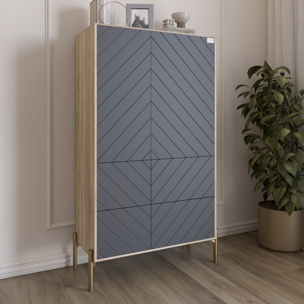 Комод-пенал з рельєфним оздобленням фасаду та золотими металевими ніжками LION Амарант 84x40x150 см Дуб сонома/Графітовий