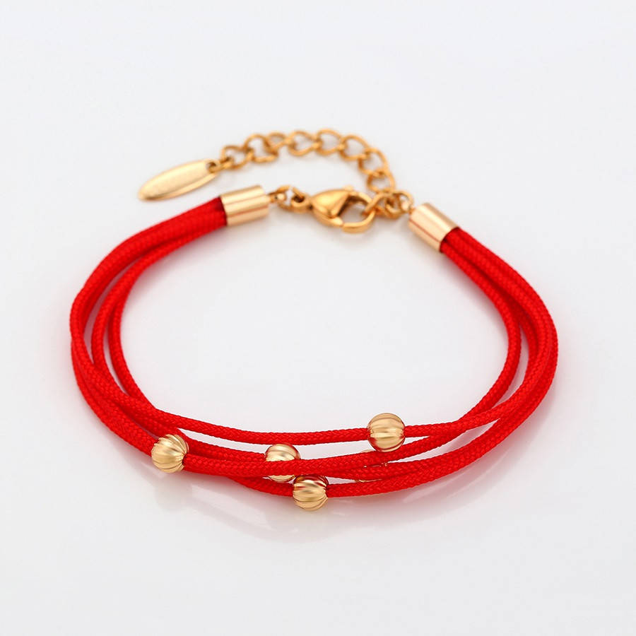 

Браслет красная нить с шариками фирма Xuping позолота 18к длина 17-21 см .