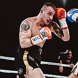 Боксерські рукавиці Leone GN047, Червоні, 12 унцій (340г.) для спортсменів 60-80 кг. + бинти, фото 9