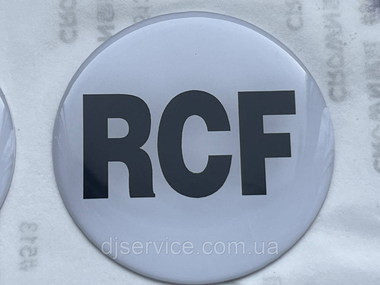 Шильдик 45 mm (самоклейний) на сітку колонки RCF, фото 1