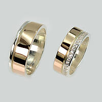 Пара обручальных колец из серебра с золотом
