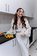 Короткий молочний кардеган з дрібними сердечками