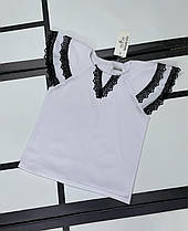 Опт блуза біла дитяча з коротким рукавом-воланом і чорним мереживом р 122-146 біла