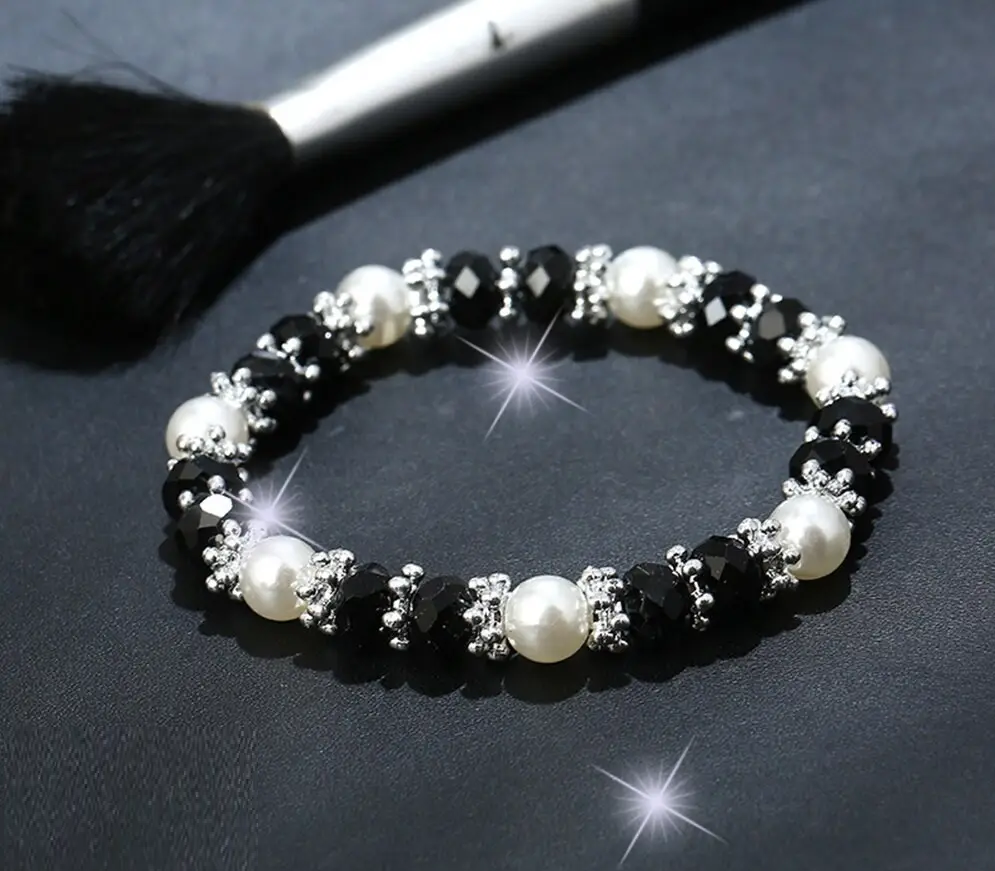 Жіночий браслет із перлами та чорними кристалами стразами регульований, фото 1