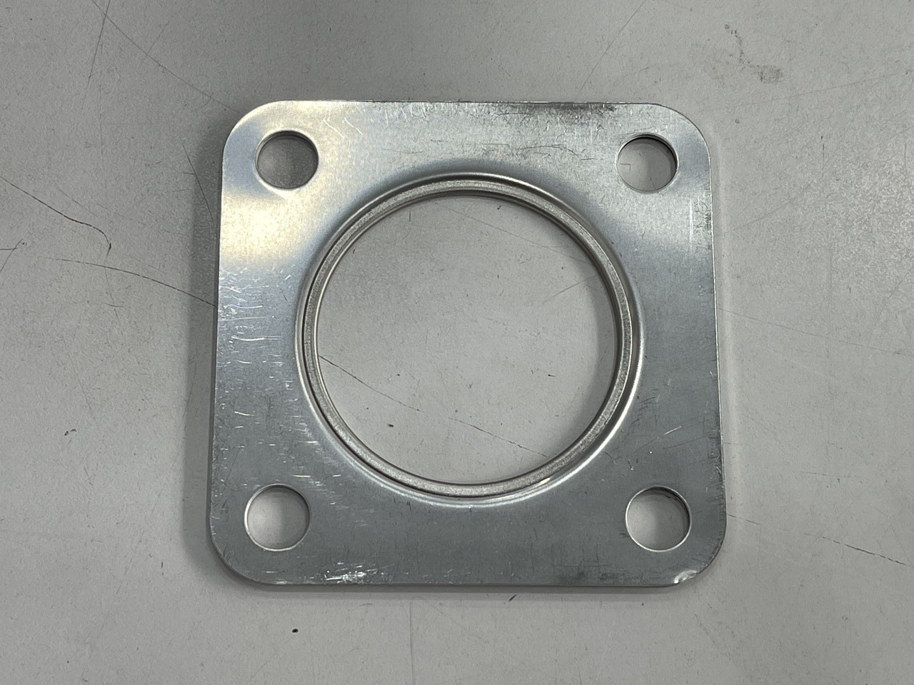 Прокладка турбіни для двигуна ISUZU 4HK1 на JCB номер 02/802545, фото 1