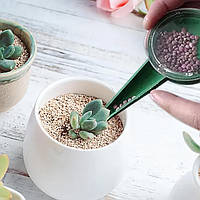 Ручна сівалка-дозатор для насіння та гранульованих добрив