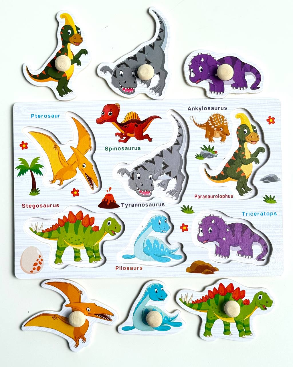 Дерев'яні пазли вкладиші С 73239 Динозаврики, під вкладишем є малюнок, фото 1