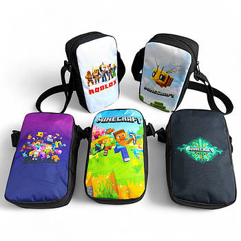 Дитяча сумочка 19,5*11 см на блискавці з довгим ремінцем принт у різних варіантах Kay