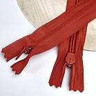 Потаємна блискавка 50 см Китай нейлонова основа колір червоний