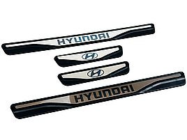 Накладки на пороги Hyundai i20 2014+ (хром-пласт) з лого TAN24