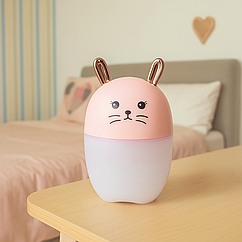 Зволожувач повітря для дитячої з підсвічуванням 220 мл очищувач повітря з ароматизацією водяний паровий Lugi Рожевий