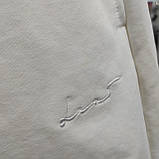 Жіночі трикотажні шорти кльош на резинці розміру L білі, фото 3