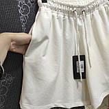 Жіночі трикотажні шорти кльош на резинці розміру L білі, фото 6