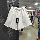 Жіночі трикотажні шорти кльош на резинці розміру L білі, фото 2