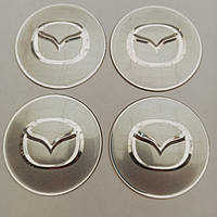 Ковпачки та наклейки для дисків мазда Mazda