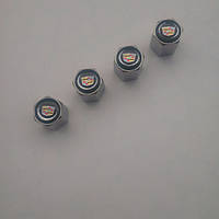 Ковпачки та наклейки для дисків Cadillac