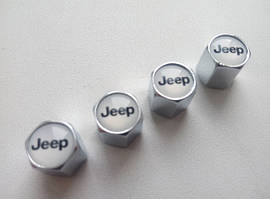 Ковпачки та наклейки для дисків Jeep