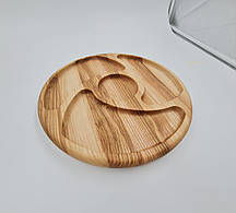 Кругла тарілка з дерева для фруктів і солодощів