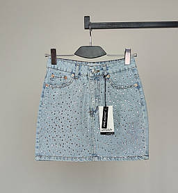 Жіноча джинсова блакитна мініспідниця з камінням