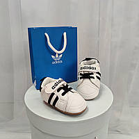 Білі пінетки кросівки Adidas