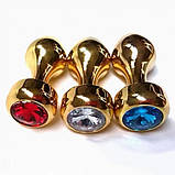 Плаг стимуляції ануса, анальна заглушка Golden Aluminum Jeweled 2.8 см з червоним кристалом, фото 2